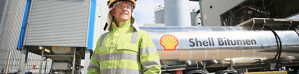 Truck driver with Shell bitumen tank